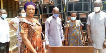 Bole DCE presents furniture to schools.