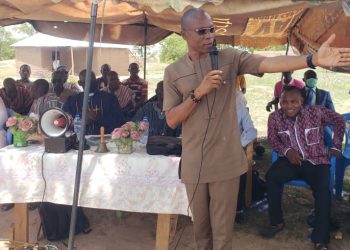 Hon. Andrew Chiwitey Dari donates cement to support church project.