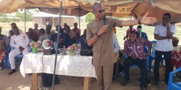 Hon. Andrew Chiwitey Dari donates cement to support church project.