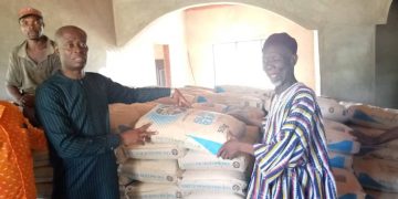 MP supports community with 350 bags of cement for the construction of household laterines.