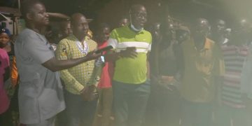 Hon. Vincent Oppong Asamoah connects two communities to the national grid.