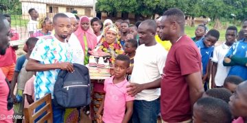 Volleyball; Officials donate to volleyball wonder kid.