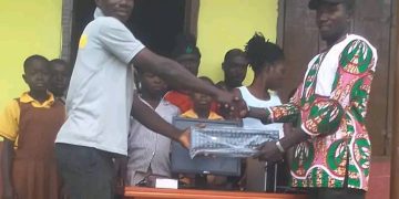 Chache Electoral Area Assemblyman gifts Chache D/A primary school a brand new desktop computer.