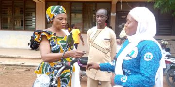 Workers of ECOZOIL in Bole District receive working tools.