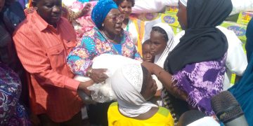 Savannah Regional Minister and Inter- Ministerial Committee on flooding tours affected areas in Buipe.