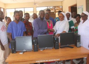 Hon. Seidu Nuhu Banasco donates computers to Nakwabi health center.