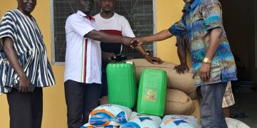 MP for Bole -Bamboi constituency presents food items and a bull to St. Anthony of Padua Senior High School.
