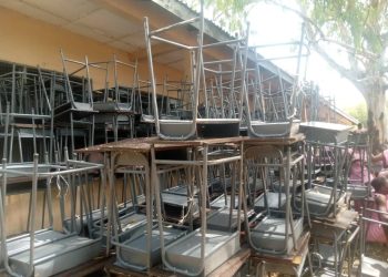 Deputy minister of lands and natural resources hands over furniture to Bole SHS