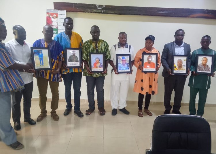 Presiding Member honours past and present DCEs with photo portraits.