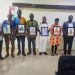 Presiding Member honours past and present DCEs with photo portraits.