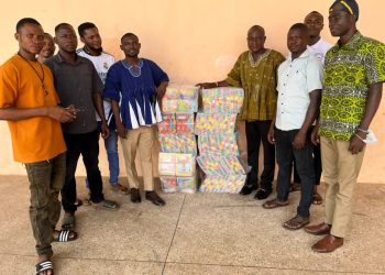 Ernest Botah donates 2,000 exercise books to schools in Sawla -Tuna- Kalba District.