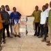 Ernest Botah donates 2,000 exercise books to schools in Sawla -Tuna- Kalba District.